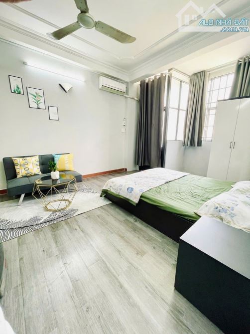 CHDV mặt tiền Nguyễn Tất Thành giáp Q1 - 3,9m x 19,5m có 10 phòng cho thuê full  chỉ 20 ty - 1