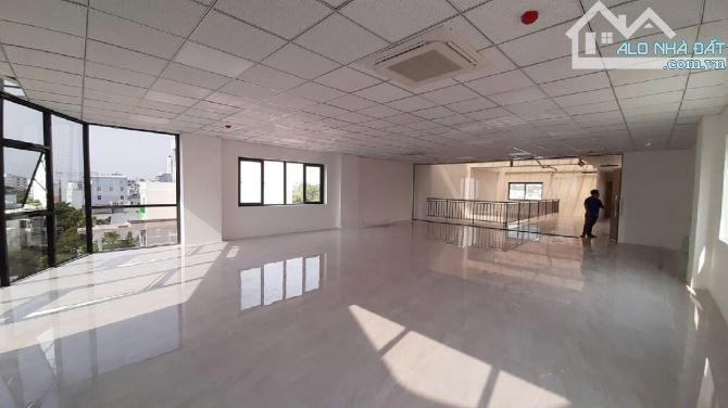 Tòa Building Văn Phòng MT Lam Sơn-Khu VIP Sân bay_8x18m_Hầm 5 Lầu_Sàn đẹp suốt_Chỉ 33 tỷ - 1