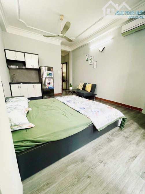 CHDV mặt tiền Nguyễn Tất Thành giáp Q1 - 3,9m x 19,5m có 10 phòng cho thuê full  chỉ 20 ty - 2