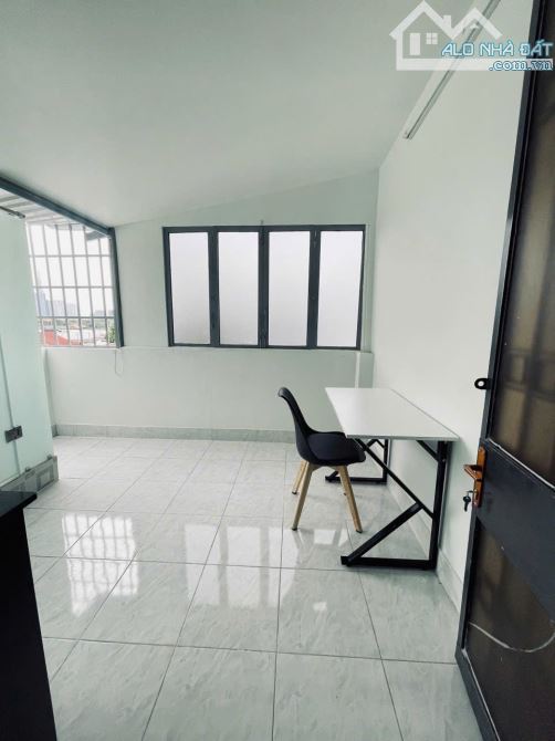 CHDV mặt tiền Nguyễn Tất Thành giáp Q1 - 3,9m x 19,5m có 10 phòng cho thuê full  chỉ 20 ty - 4