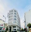 Bán tòa Building mặt tiền ngay Huỳnh Văn Bánh - 15x30m. Hầm 9 lầu.HĐT:430 tr/th. Giá 100ty