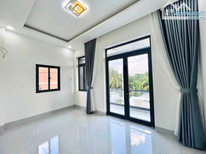 Nhà lầu 4 phòng ngủ ngay chợ lớn ngang 5x23m bàn giao hoàn thiện 100%, về trung tâm BH 10p - 2