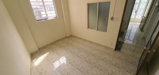 tài sản bán gấp nhà mt số 218 Nguyễn Đình Chính DT 4x13,2 CN 55m2 3 tầng giá 9,2 tỷ - 6