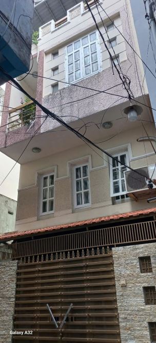 Bán nhà 4 tầng trung tâm quận 3 Lê Văn Sỹ 51 m2 - 9