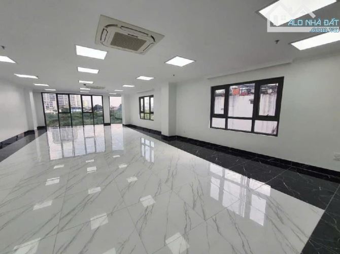 BÁN TÒA NHÀ VĂN PHÒNG 9 TẦNG PHỐ HOÀNG QUỐC VIỆT, 130M2, MT 6.2M GIÁ NHỈNH 50 TỶ - 1