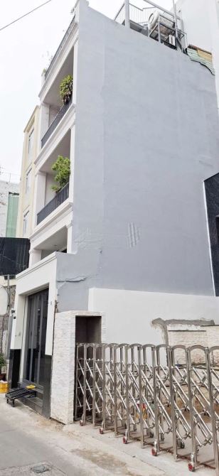Nhà mặt tiền, đường 8m, gần Bàu Cát, 4x21.5m (nhà 4 tầng mới đẹp), 8.9 tỷ TL