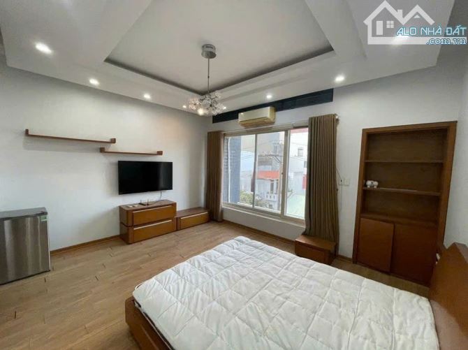 Cho thuê nhà tại Văn Cao cực đẹp, 100m2, 6 tầng, 8 ngủ khép kín thang máy, full , 36 triệu - 1