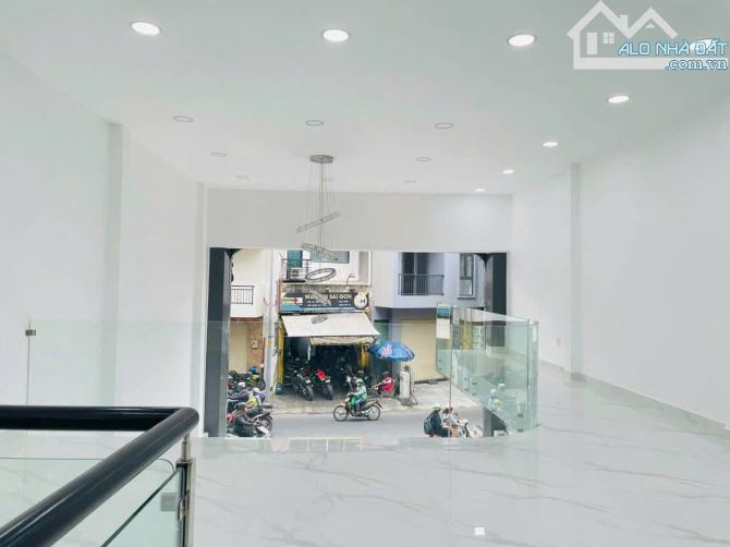 Nhà mới, mặt tiền đường Nguyễn Thái Bình, DTSD 100m2 - 3