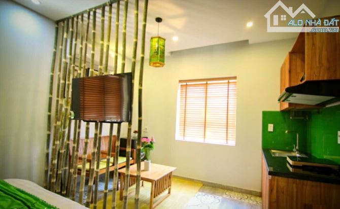 BÁN TOÀ APARTMENT 7 TẦNG ,NGAY BIỂN MỸ KHÊ ,DÒNG TIỀN 70TR/THÁNG - 8