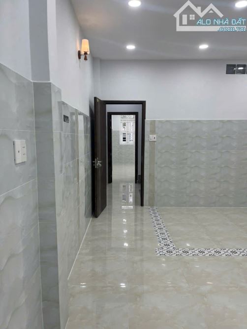 Nhà mới 3 lầu hẽm xe hơi Quang Trung P.12 Gò Vấp DT: 4.05x20.2 Giá: 8.98 Tỷ TL - 3