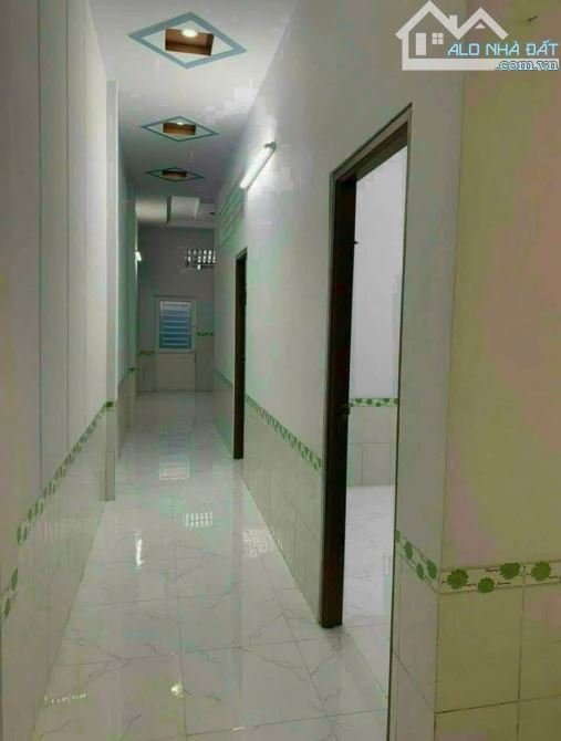 Nhà ngộp Bán gấp nhà sẹc Trường Chinh,Quận 12 , Sổ hồng đầy đủ , 1tỷ190 , 136m2 - 4