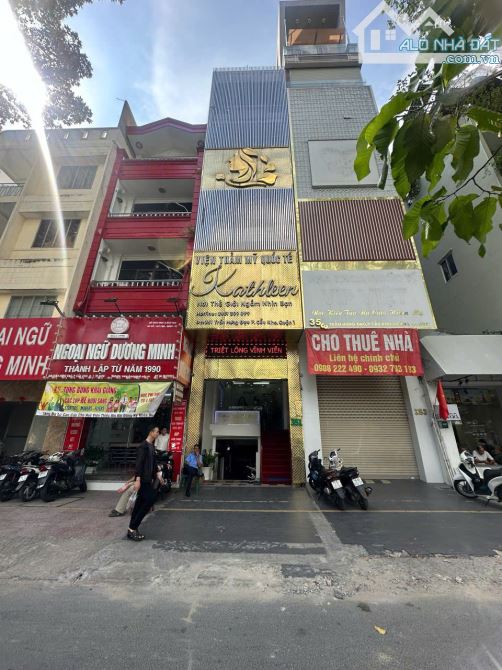 Cho thuê nhà MT 351 Trần Hưng Đạo P. Cầu Kho Quận 1, hầm 4 lầu thang máy, 125 triệu - 18