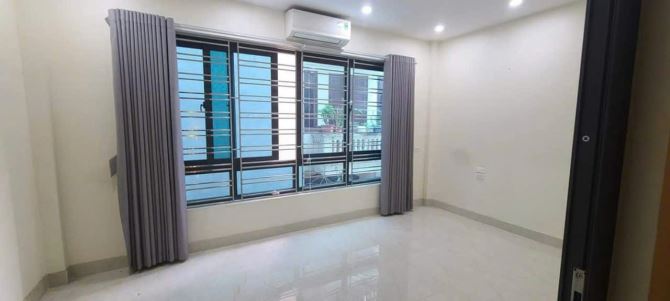 Bán nhà phố Nguyễn Ngọc Vũ, Cầu giấy, gần ô tô, ở ngay 5 tầng 50m2 mt 5m, giá 11.5 tỷ - 2