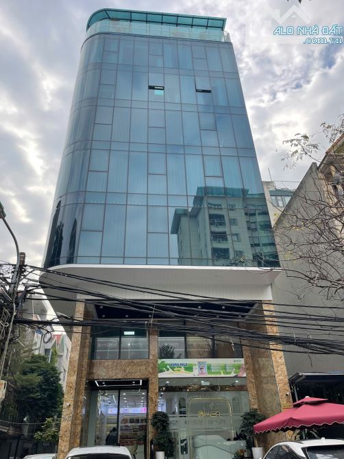 Cho thuê nhà mặt phố Đình Thôn . DT : 80 M * 7 Tầng . MT : 6 M . Thông sàn, Thang máy - 1