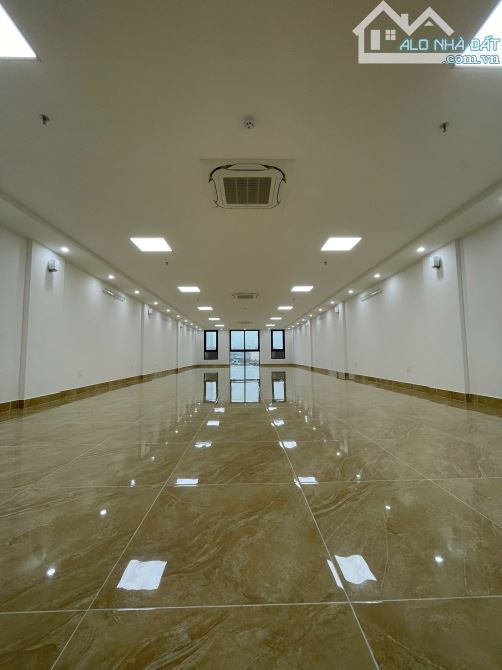Cho thuê nhà mặt phố Đình Thôn . DT : 80 M * 7 Tầng . MT : 6 M . Thông sàn, Thang máy - 2