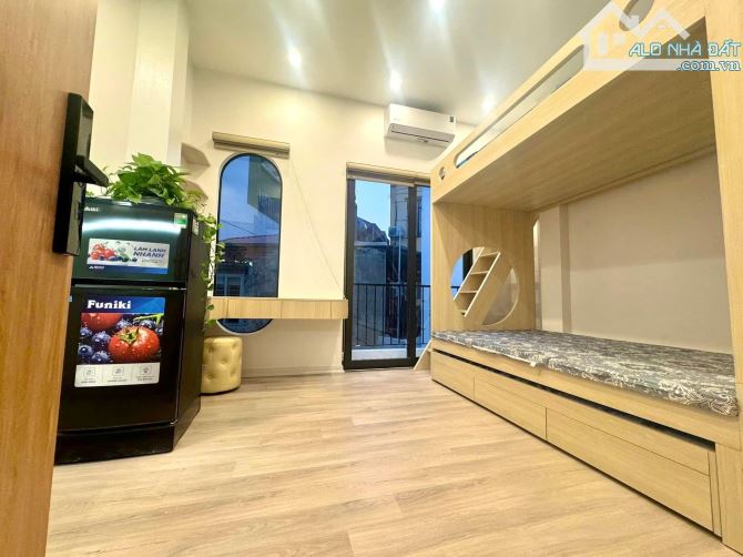 Cần bán trả nợ! Bán toà CHDV mới gần KTQD 69m2*7 tầng 17PN DT 1 tỷ/năm, phân lô oto, PCCC - 2