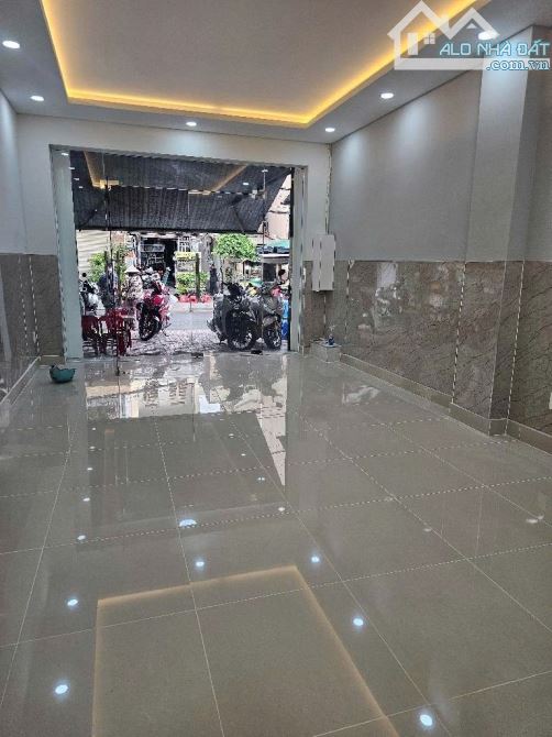 NHÀ MỚI 3 TẦNG, 70m2 , MẶT TIỀN KINH DOANH CẠNH TẠ QUANG BỮU