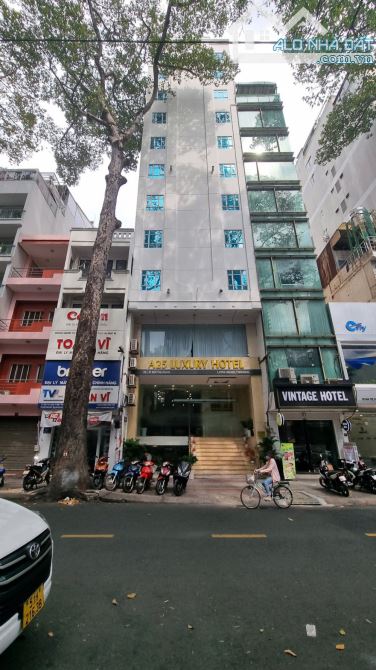 Bán khách sạn mặt tiền đường Bùi Thị Xuân, Quận 1, dt: 4x20m hầm 10 tầng 24p 80 tỷ - 1