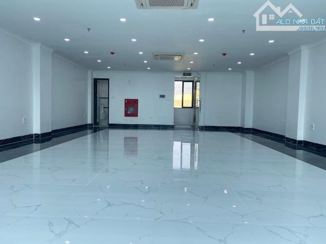 BÁN TÒA VĂN PHÒNG KHUẤT DUY TIẾN, 80M2, 9 TẦNG, MT 7.2M, VỈA HÈ, DÒNG TIỀN 1.2 TỶ/NĂM - 2