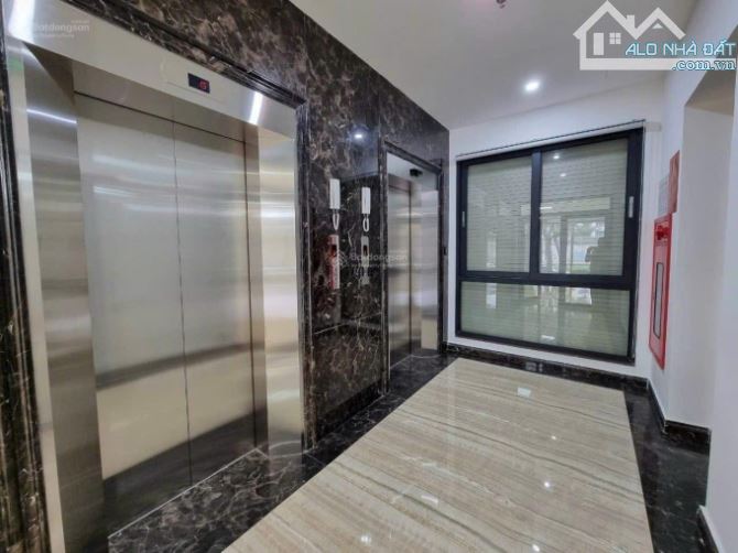 Bán tòa nhà Văn phòng mặt phố  Lê Văn  Lương, Trần Duy Hưng. 1400m2, 18 tầng MT30m. - 1