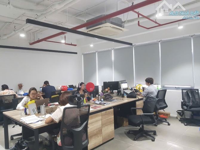 Bán tòa nhà Văn phòng mặt phố  Lê Văn  Lương, Trần Duy Hưng. 1400m2, 18 tầng MT30m. - 2