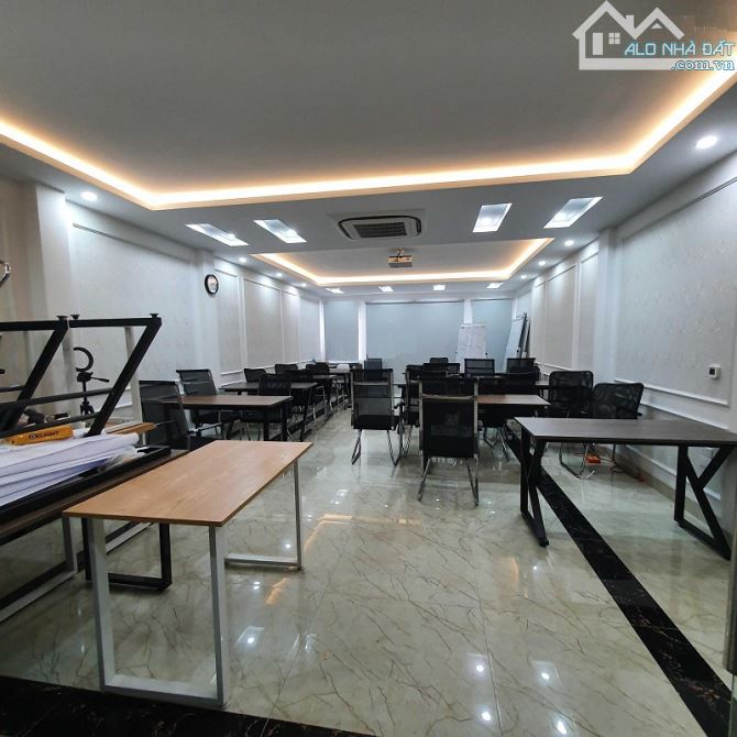 Cho thuê nhà phố Dương Quảng Hàm, Diện tích 90m2 x 6 tầng xây thông sàn, lô góc - 2