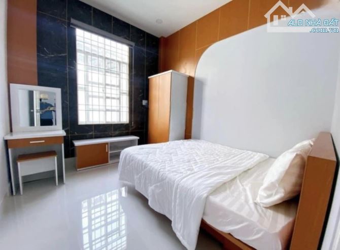 Bán nhà mặt tiền Nguyễn Thị Minh Khai P8 VT 1T3L 6PN hồ bơi, nội thất cao cấp. Giá 12 tỷ T - 1
