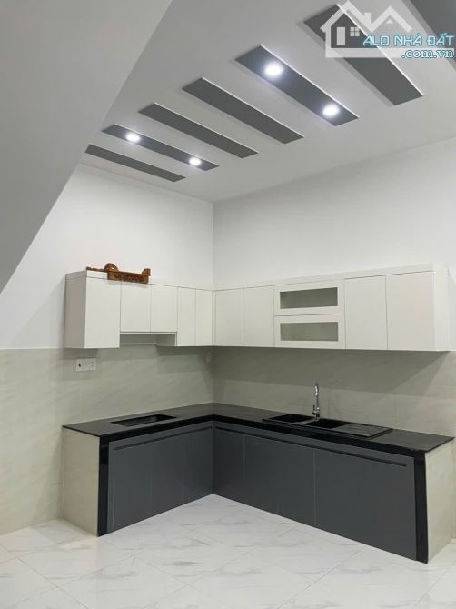 Bán gấp nhà tân cổ điển 1 trệt 1 lầu sân xe hơi KDC Tân Triều sổ riêng thổ cư 100% - 12