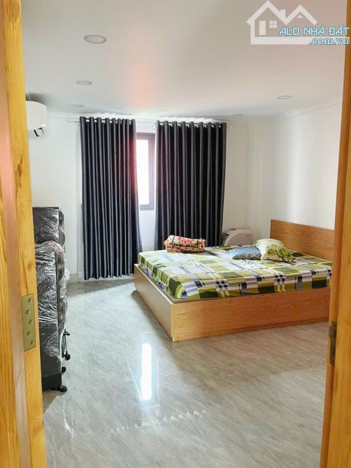 bán nhà hẻm xe hơi đường Nguyễn Thị định P.Cát lái Q.2 - 5 Tầng 75m2 - 3