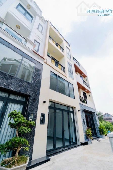 bán nhà hẻm xe hơi đường Nguyễn Thị định P.Cát lái Q.2 - 5 Tầng 75m2 - 8
