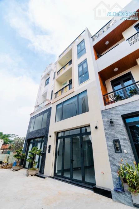 bán nhà hẻm xe hơi đường Nguyễn Thị định P.Cát lái Q.2 - 5 Tầng 75m2 - 9