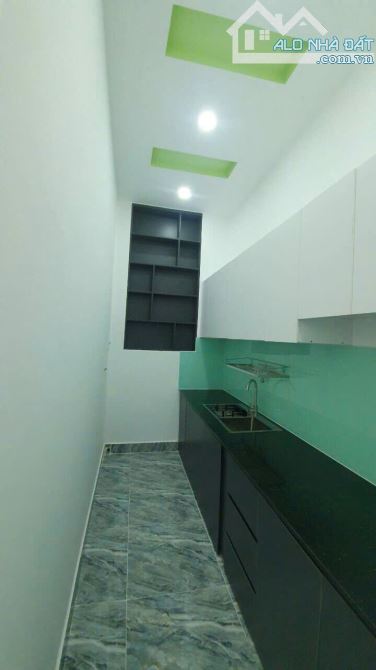 Bán nhà hẻm xe hơi thông ,Trần Bình trọng ,Quận 10,52m2 ,3 tầng ,5PN,sổ nở hậu. - 2