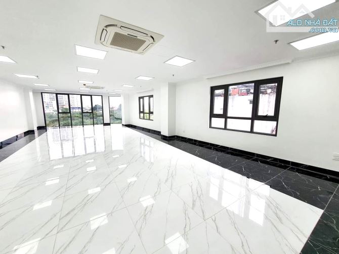 Bán tòa Bulding phố Hoàng Quốc Việt, 121m2, 8 tầng, mặt tiền 6.5m, Lô Góc, Kinh Doanh Đỉnh - 1