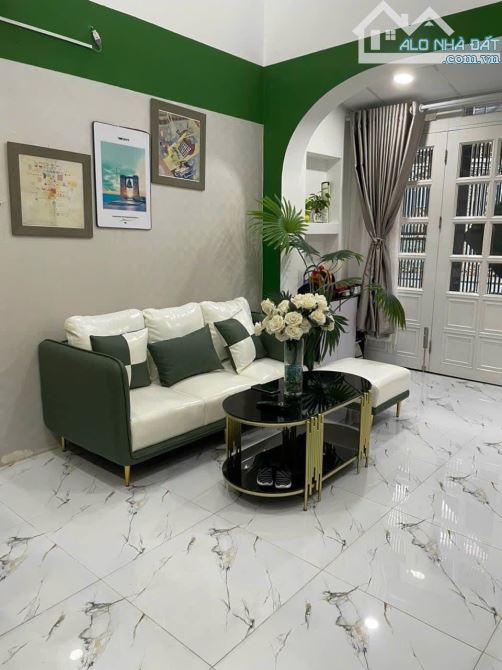 BÁN NHÀ LÔ GÓC HẺM Ô TÔ 5 TẦNG NGUYỄN CỬU VÂN P17 BÌNH THẠNH 6.x TỶ - 5