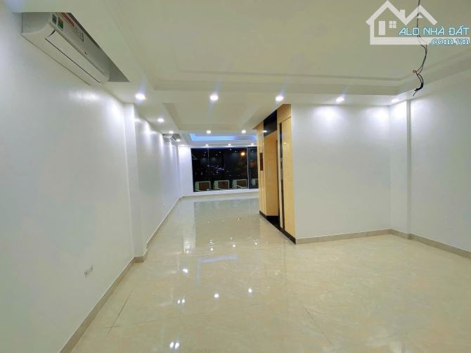 Mặt phố Nguyễn Khang Tòa nhà 9 tầng thang máy vỉa hè rộng. - 1