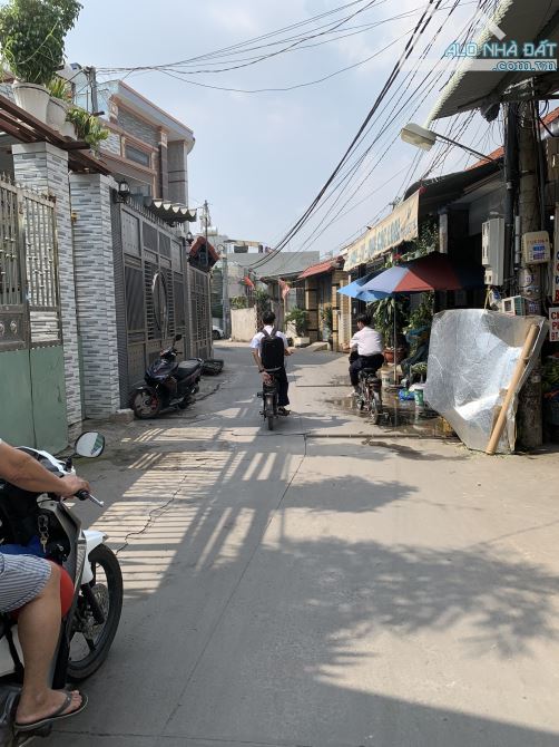 Chỉ hơn 1 tỷ xíu có ngay lô đất 100m2 sổ hồng riêng ngay chợ Trại Bò, phường Long Bình - 2