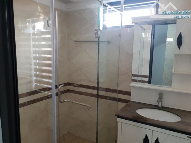 BÁN NHÀ MP VÕNG THỊ.NHÀ XÂY SẴN 9 TẦNG 1 HẦM.DT:100M2,MT:6M.VỊ TRÍ ĐẸP.KD CHO THUÊ TỐT. - 2