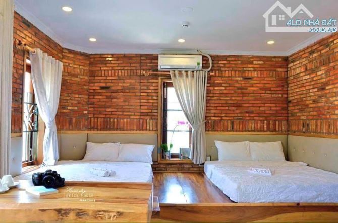 10tỷ500tr Căn nhà 7 tầng góc 2 MT hẻm ô tô khu phố tây trung tâm Nha Trang - 1
