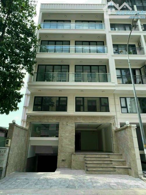 Bán Tòa Nhà HXH khu Phan Xích Long P7 Phú Nhuận DT 8.2x22m CN 208m2 Hầm 6 tầng giá 35 tỷ
