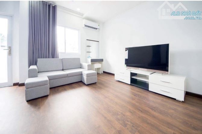 Bán nhà góc 2Mt  xe hơi Trần Hưng Đạo, Quận 1, 4 lầu, HĐ thuê 70 triệu - 2