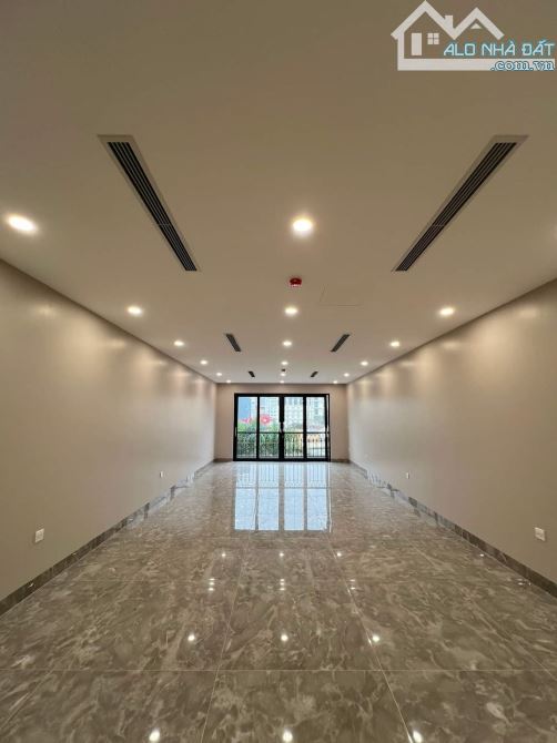 Bán Tòa Nhà MP Trần Quý Cáp, Đống Đa, 90m2, 9 tầng thang máy, giá 52 tỷ - 1