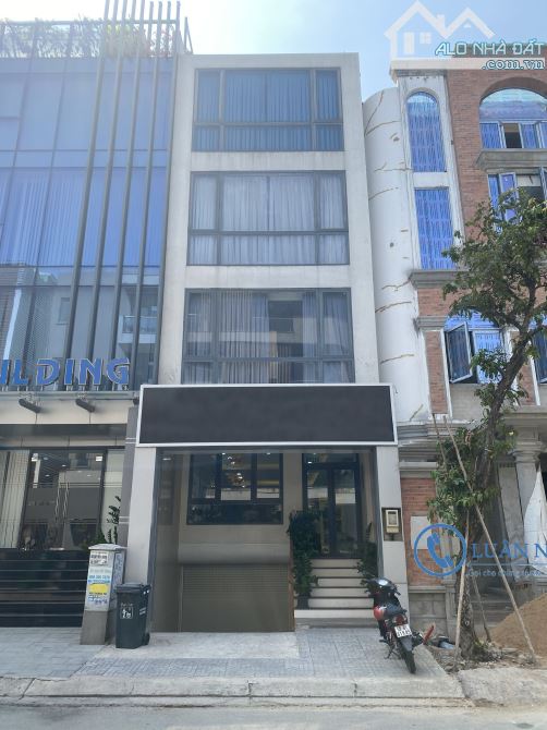 Cho thuê Tòa nhà văn phòng Ngay song hành KĐT mới An Phú Quận_2 Hầm 4 tầng nổi 400m²