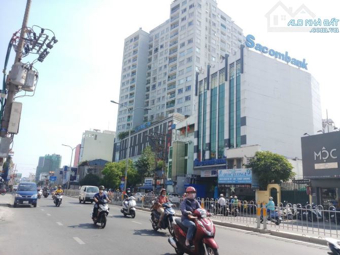 Cần bán gấp MT Lê Đức Thọ, P13, GV DT 30x100m CN 2.700m2 trệt 4 lầu giá chỉ 140 tỷ