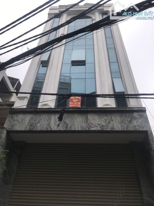 Biuldinh mặt phố 8T thang máy có hầm. DT 180m2 MT 6.5m. Giá 34.8 chưa đến 200tr/m - 1