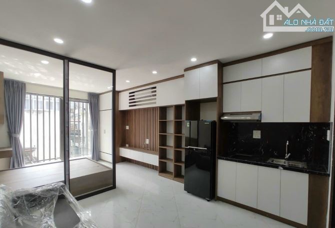 Bán nhà Thịnh Quang, Ngõ thông, Ô tô đỗ cửa, Thang máy, 70m2, MT4m, 7 tầng
