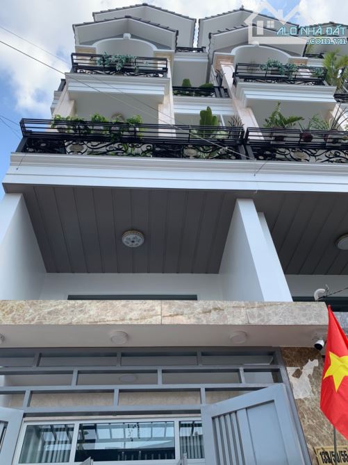 Cần bán gấp căn nhà MTKD Ni Sư Huỳnh Liên quận Tân Bình 6.95x18.23m nhà mới 5 tầng