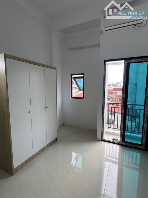 Bán tòa nhà CCMN Phùng Khoang, DT 70m2 xây mới 6 tầng thang máy, gác xép 16pkk giá 12.5 tỷ - 2