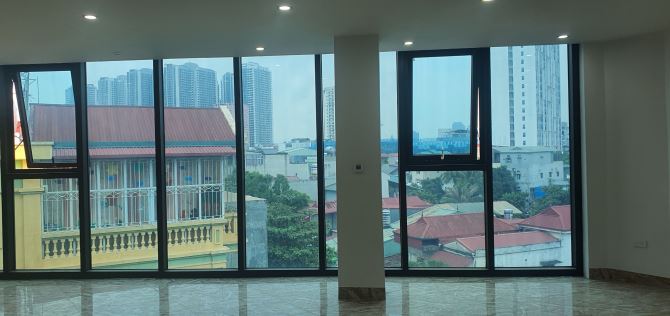 Cho thuê nhà mới hoàn thiện khu Hồ Tùng Mậu, Cầu Diễn, 90m2 6 tầng 1 hầm, giá 42 triệu/th - 1