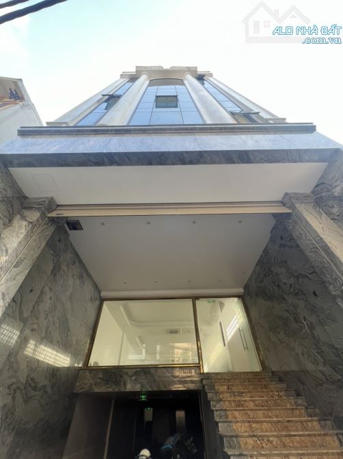 Tòa Biudinh 8T thang máy, DT 180m2 MT 6,5m  có hầm. Sổ vuông đẹp, thoáng 4 mặt - 1