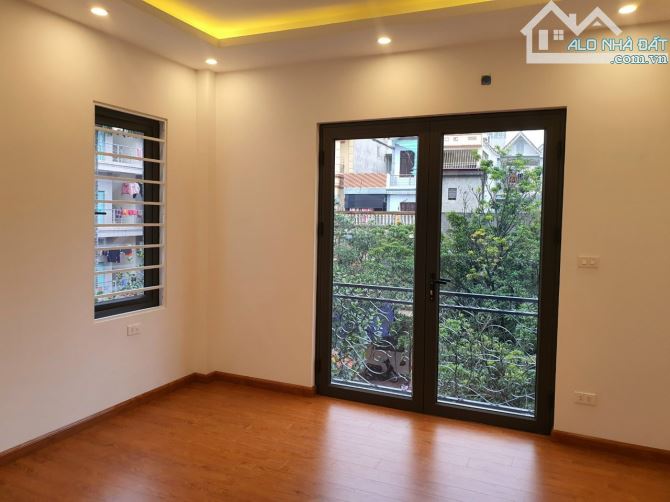 Nhà mới Cạnh Nhổn 40x5 tầng 7 ngủ, ô tô, giá 4.95 tỷ - 1